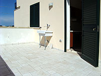 Verandina esterna con pilozza
